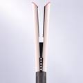 Pink corded wet-to-dry air straightener — edited close-up, lower housing outside the frame